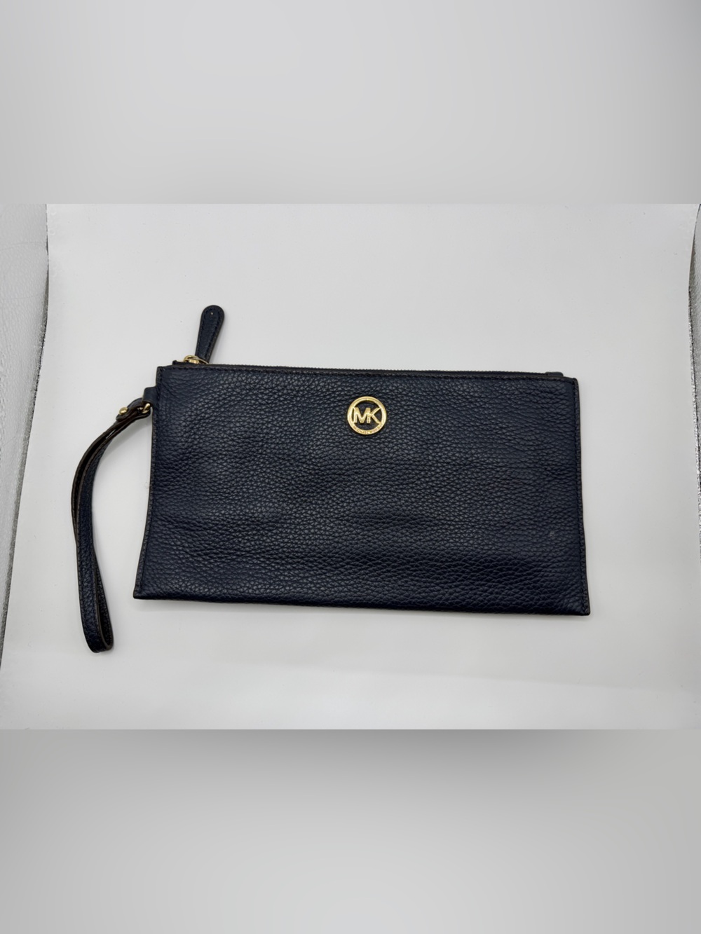 Michael Kors Navy Pebbled Leather Wristlet with Gold MK Emblem